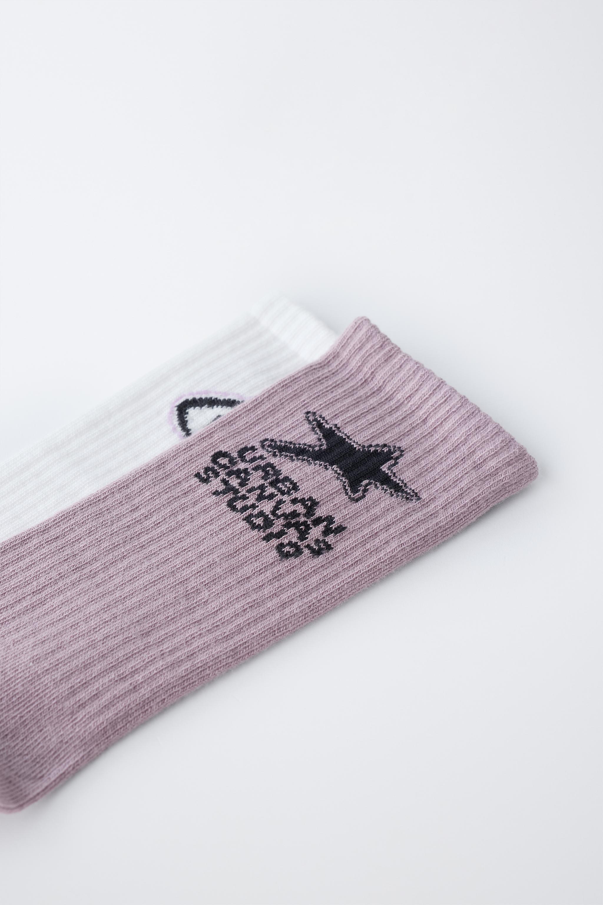 LOT DE DEUX PAIRES CHAUSSETTES LONGUES IMPRIMÉES